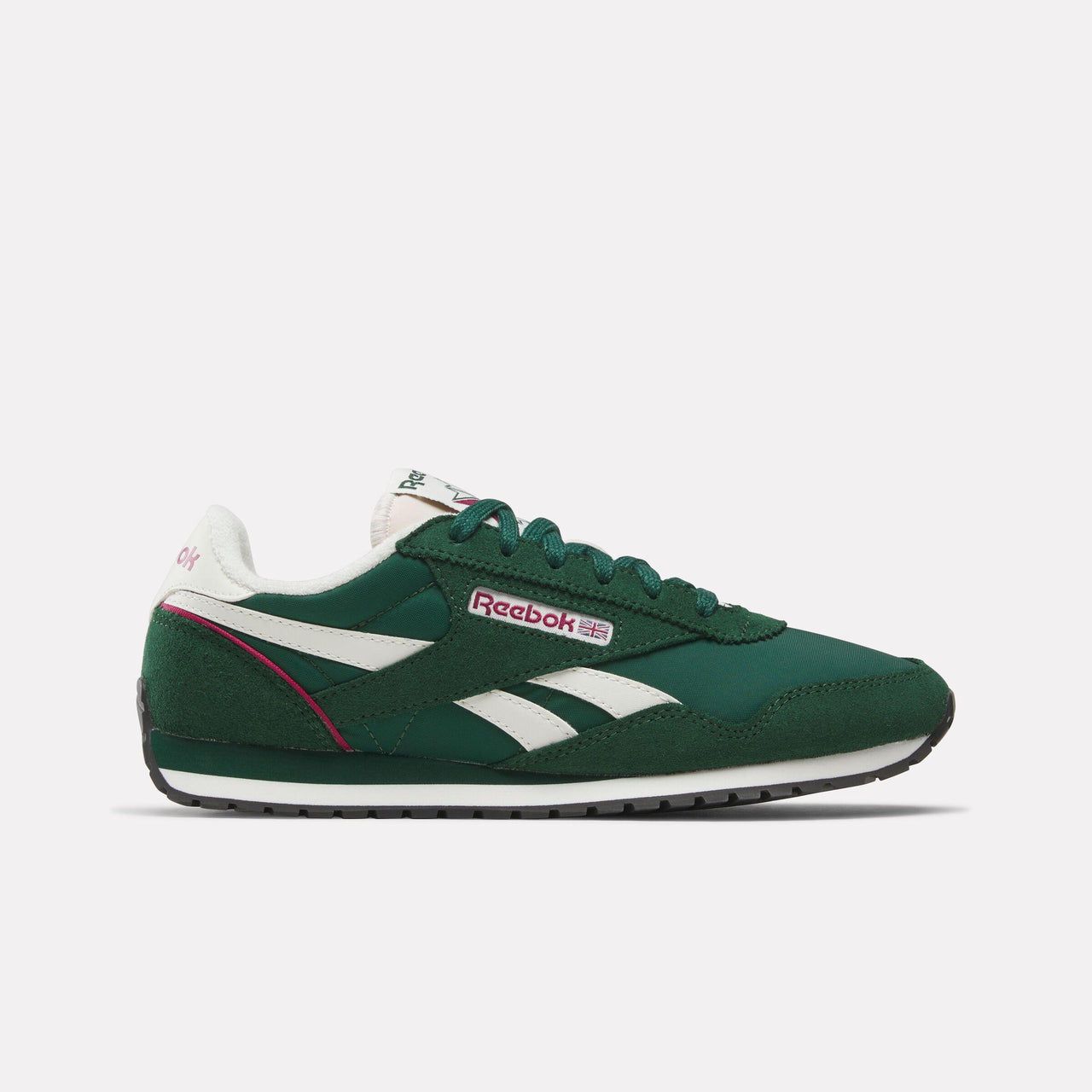 Low-profile green sneaker with white stripes and Reebok logo.
