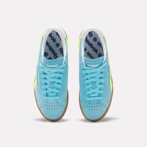 Top view of light blue shoes with light blue laces and rubber soles.