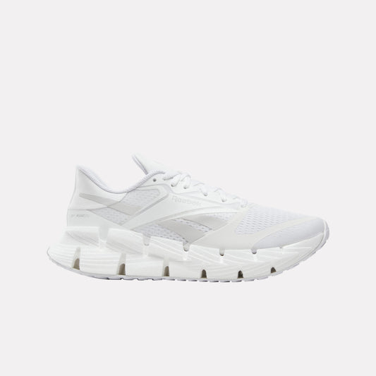 White athletic sneaker with Zig midsole.