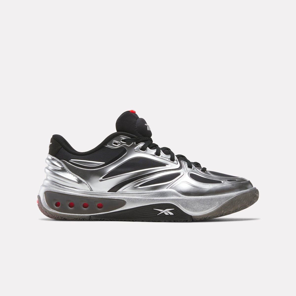 Low top basketball shoe with silver metallic detailing and black accents.
