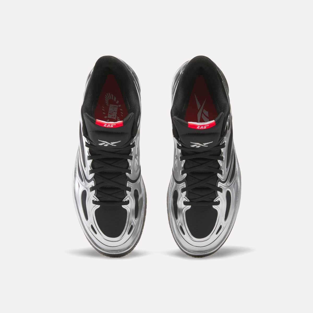 Pair of silver and black high-top athletic shoes with black laces, black and red interior.