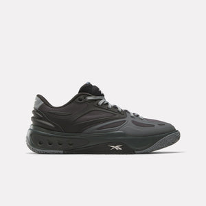 A black athletic shoe with gray laces and a gray sole featuring a small white logo near the toe.