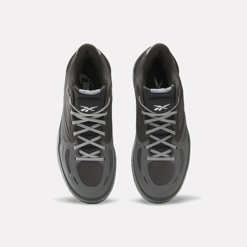 Pair of dark gray athletic shoes with gray laces, top view.