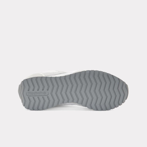 The outsole of a shoe with a waffle pattern. A logo is visible.