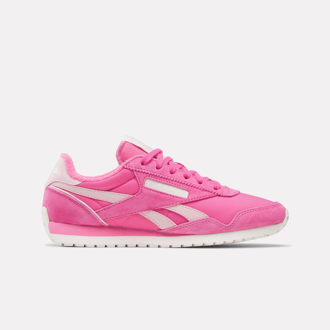 Pink athletic shoe with white stripes and sole.