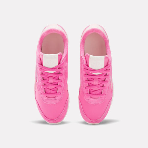 Pair of pink running shoes with white accents.