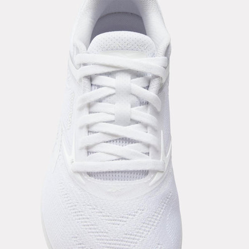 White athletic shoe with laced closure.
