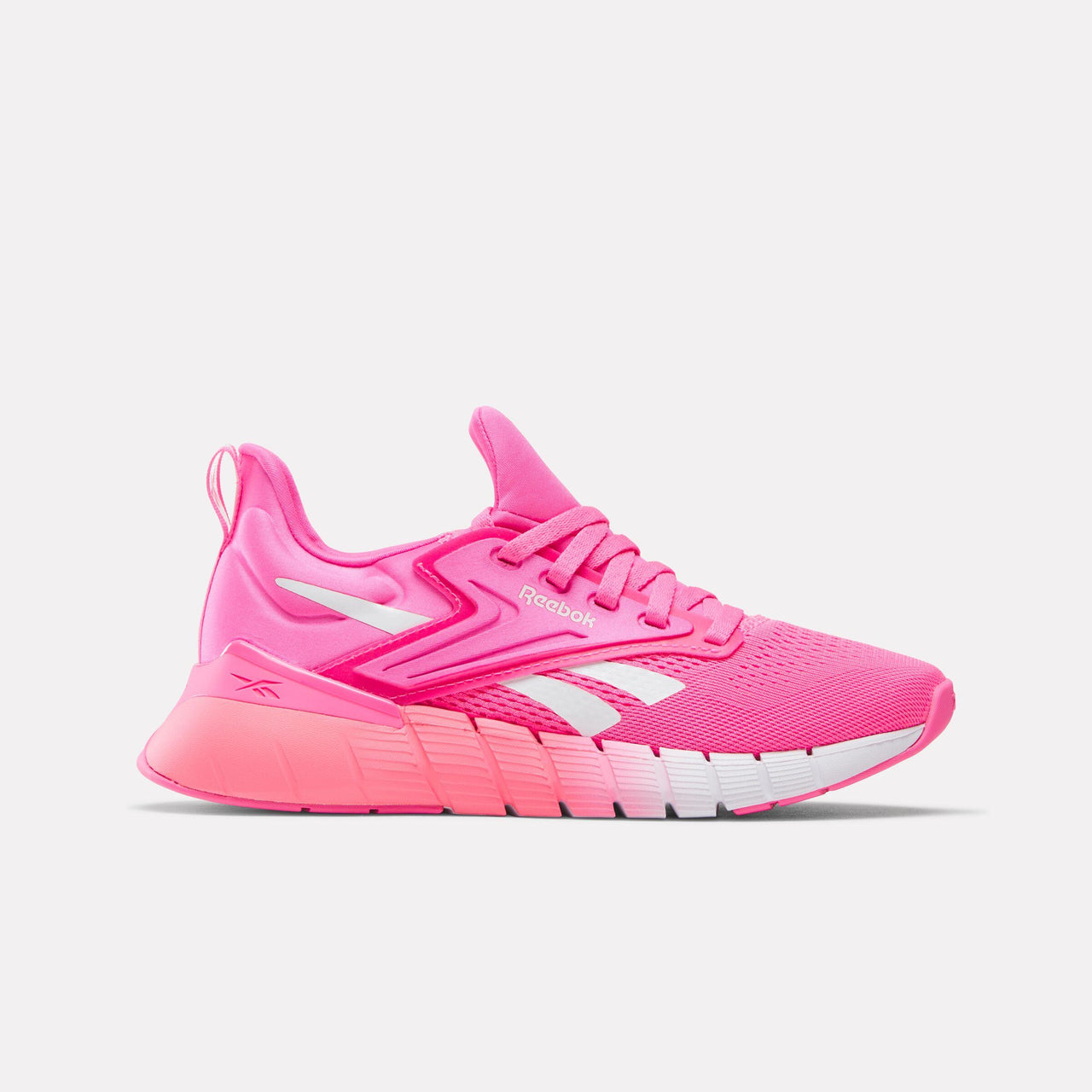 A pink sneaker with white accents.