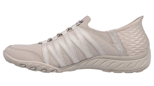 Beige slip-on sneaker with elastic straps and textured heel.