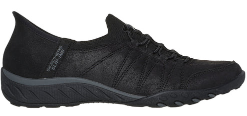 Black slip-on sneaker with a black sole.