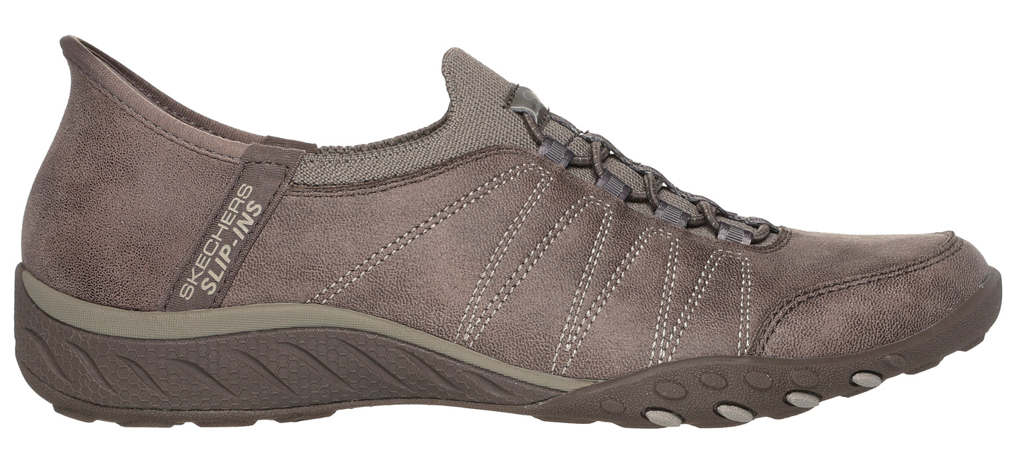 Taupe slip-on casual shoe with elastic laces.