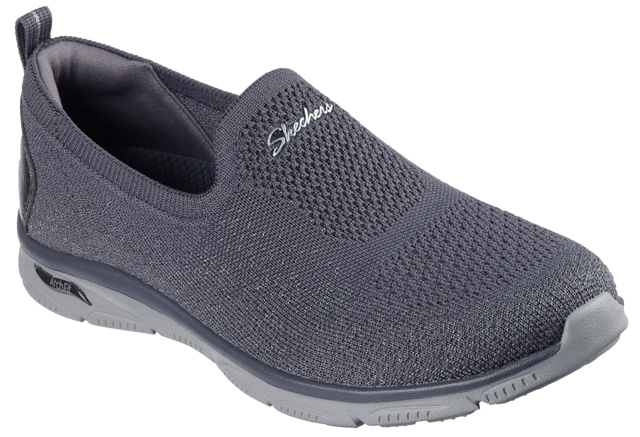 Slip-on shoe, gray knit upper, arch support midsole, and “Skechers” logo.
