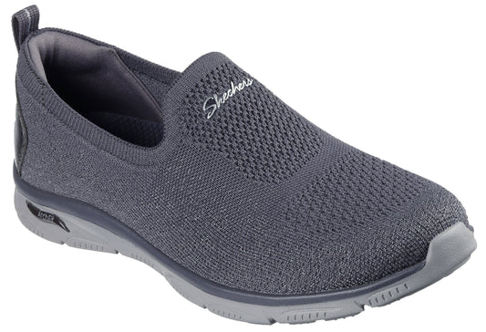 Slip-on shoe, gray knit upper, arch support midsole, and “Skechers” logo.