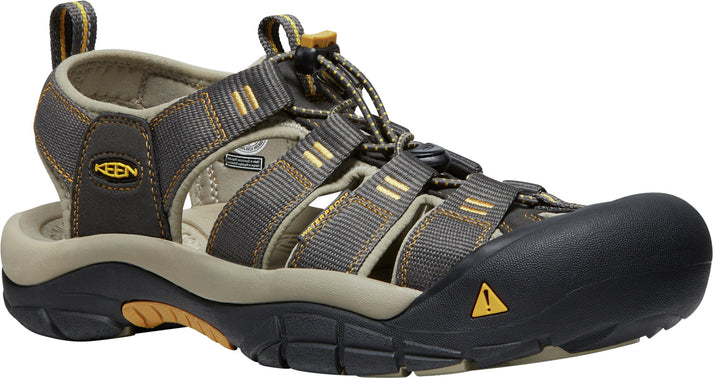 Gray sandal with toe protection, lace closure, textile straps, and a rubber sole with a triangle logo.