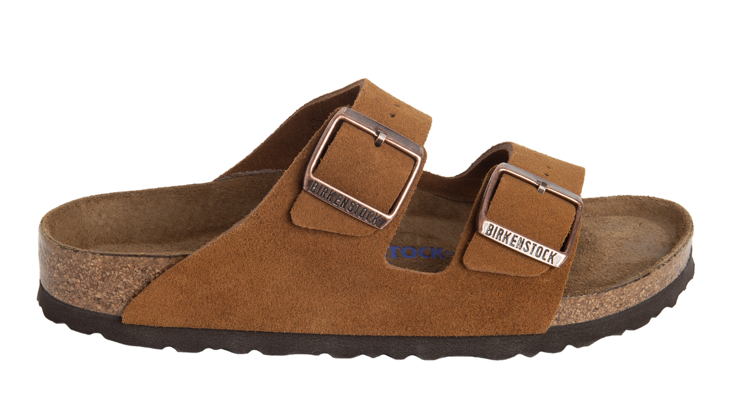 Brown suede two-strap sandal with adjustable metal buckles.