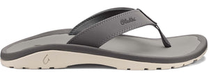 A gray sandal with a toe post.