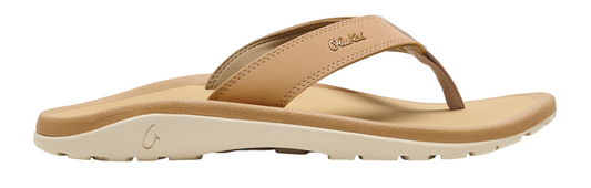 A tan flip-flop with a strap and a logo.
