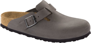 A gray clog with a single buckle strap.