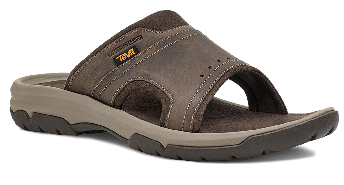 Brown leather slide sandal with brown sole and visible logo.