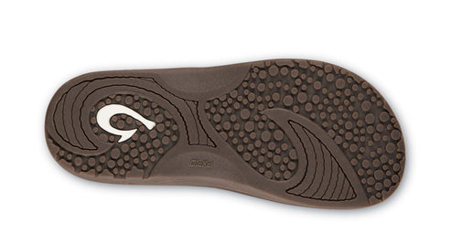 Sole of brown sandal with white hook-shaped design.