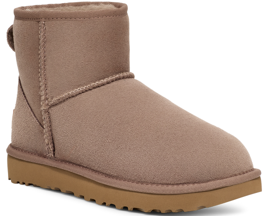 Ankle-high brown suede boot with visible sole.