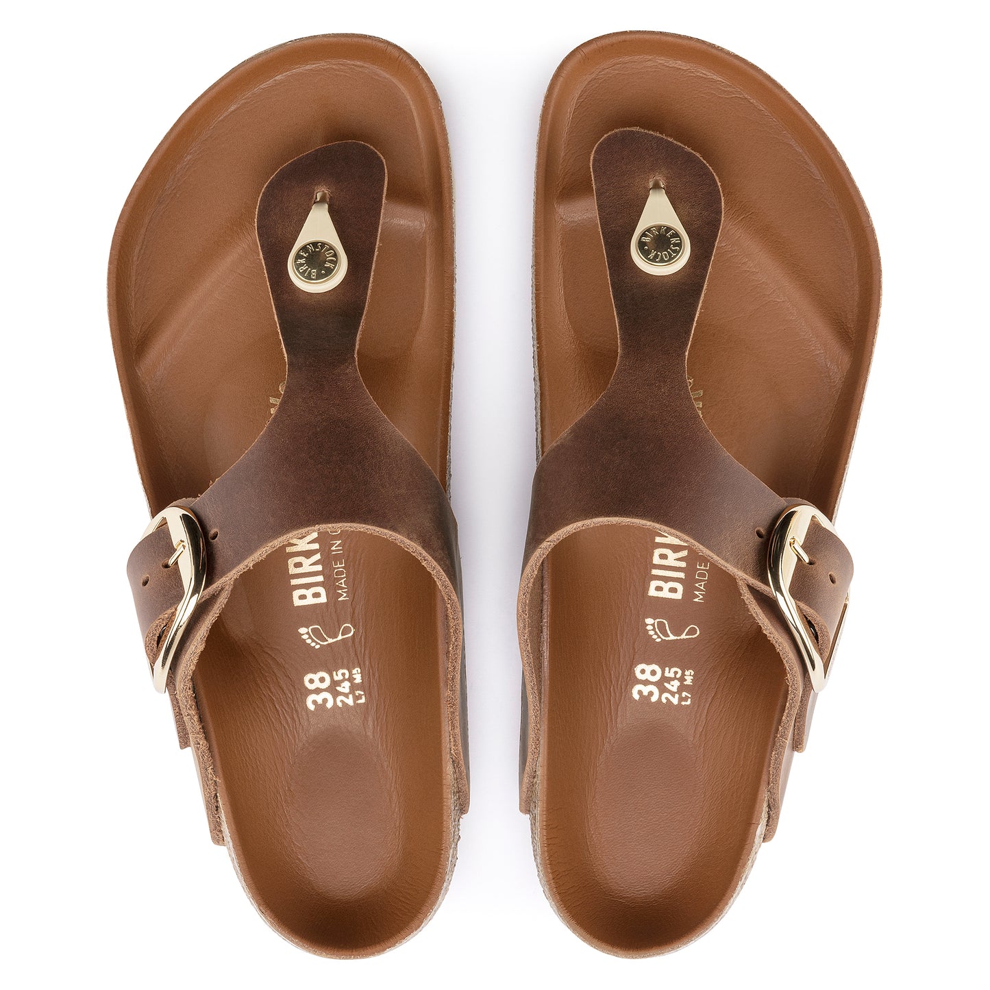 Pair of brown leather thong-style sandals with gold buckles. The insole has "BIRK" and shoe size embossed on it.