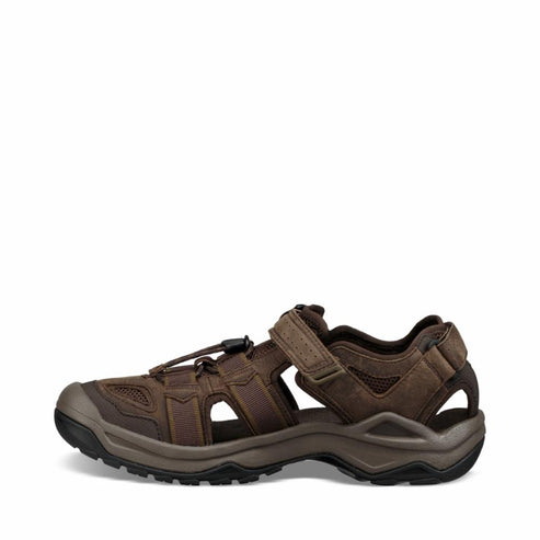 Brown leather hiking sandal with velcro strap.
