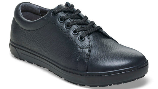 Black leather lace-up sneaker with a round toe and black laces.