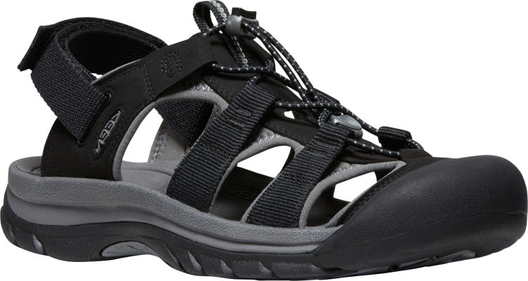 Black sandal with a black foot covering, and black adjustable velcro strap, black and gray bungee lacing, and gray sole.