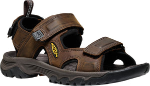 Brown leather sandal with two velcro straps.