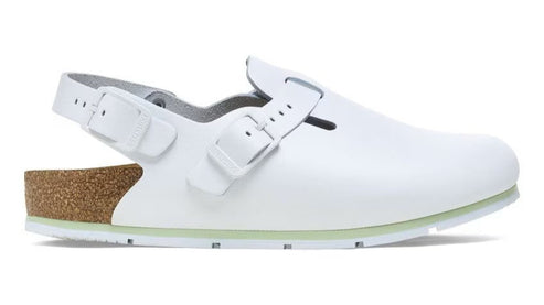 White clog-style shoe with an adjustable buckle strap and cork sole.