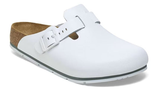 White clog with buckle strap and cork footbed.
