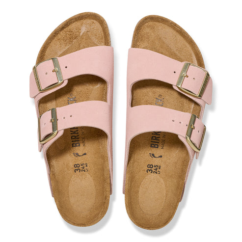 Two pink sandals with two straps and silver buckles.