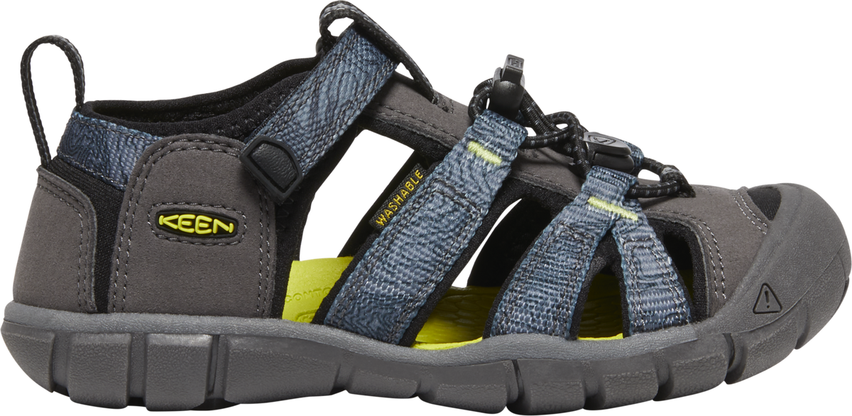 Gray sandal with navy blue patterned straps and yellow accents.