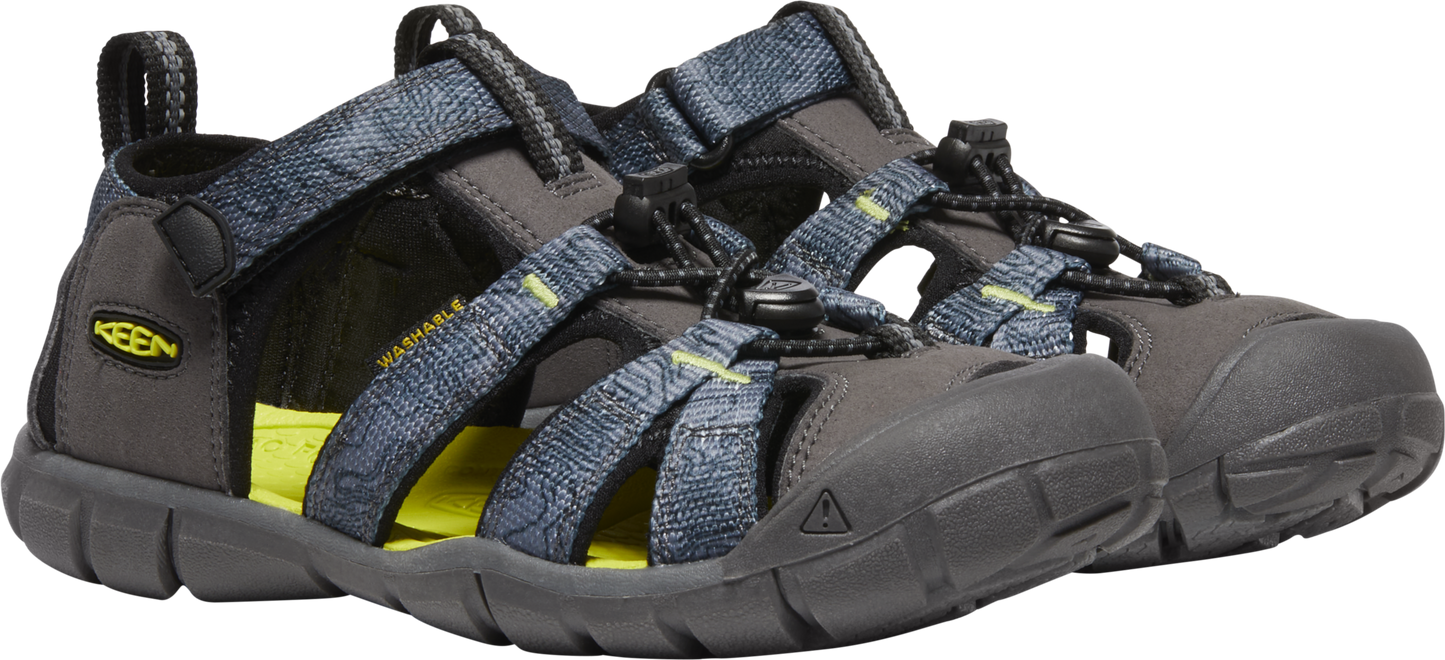 a pair of open toe dark gray sandals with navy blue criss cross straps and a pull string to tighten