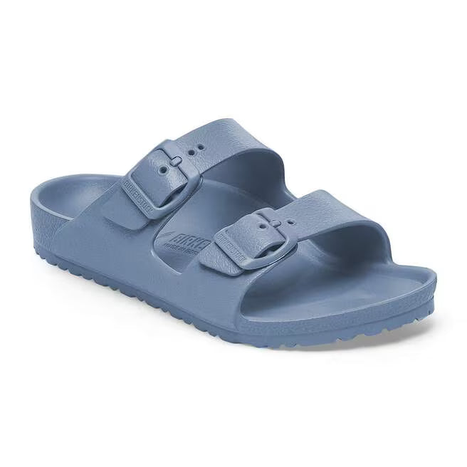 Blue two-strap slide sandals with adjustable buckles.