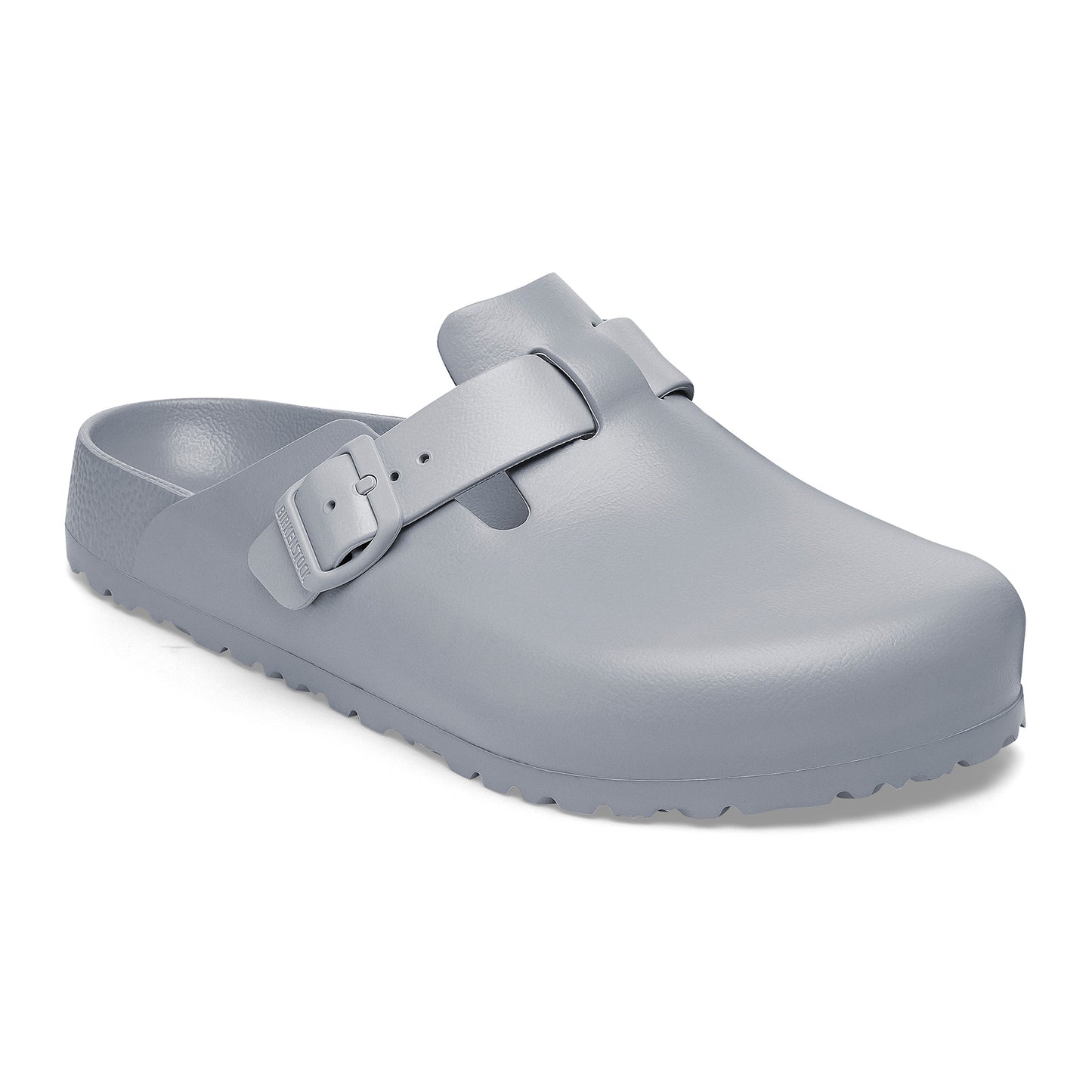 Gray clog with an adjustable strap and buckle.