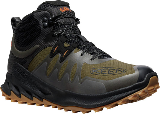 A high-top hiking shoe with a black collar, green/black patterned upper, black midsole, and brown outsole.