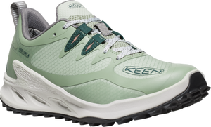 A sage-green shoe with dark-green accents and white soles, visible lacing and grey padded interior.