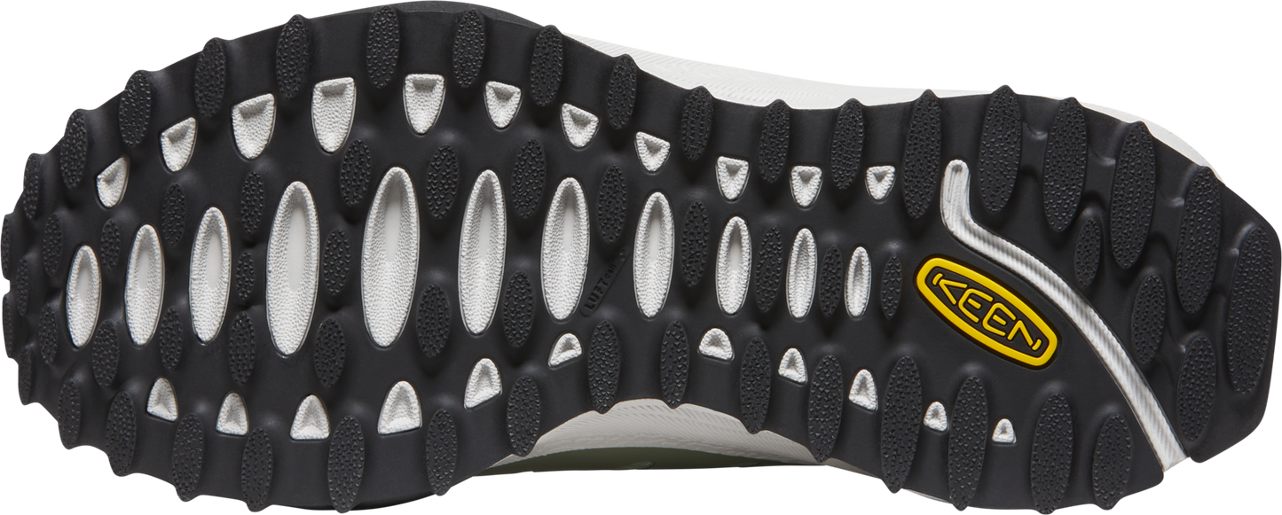 Sole of a shoe with oval-shaped grooves and a KEEN brand logo.