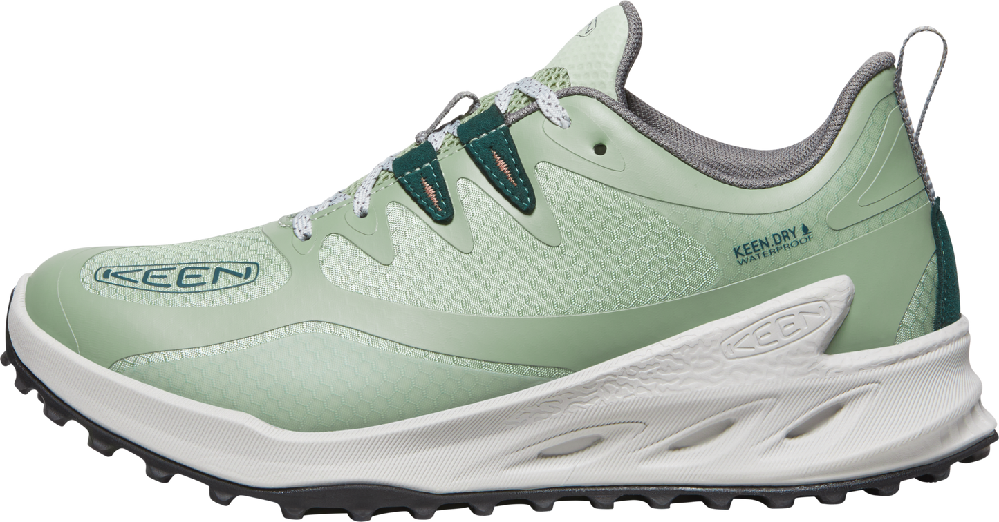 Light green athletic shoe with white laces and sole; KEEN logo on the side.