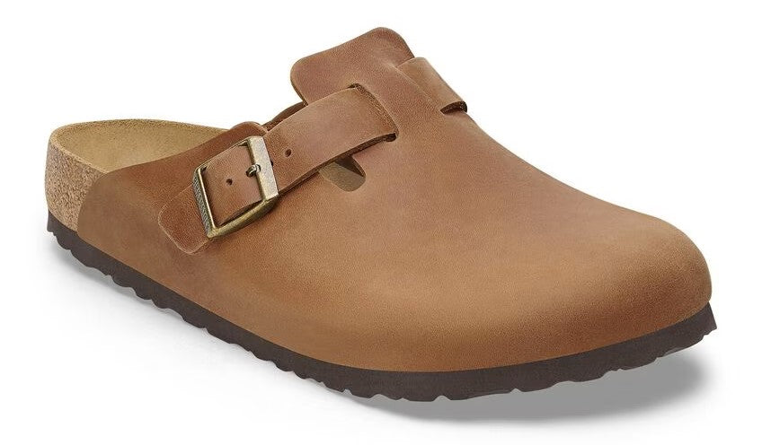 Brown leather clog with adjustable buckle strap.