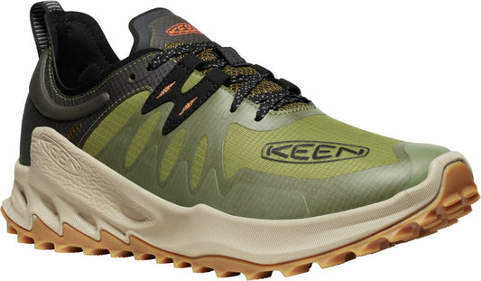 A low-cut olive green athletic shoe with tan sole and black laces.