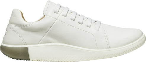 A white leather sneaker with a contrasting sole.