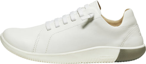 A white leather sneaker with matching sole and laces.