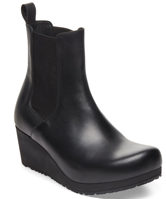 Black leather heeled Chelsea boot with elastic side panel.