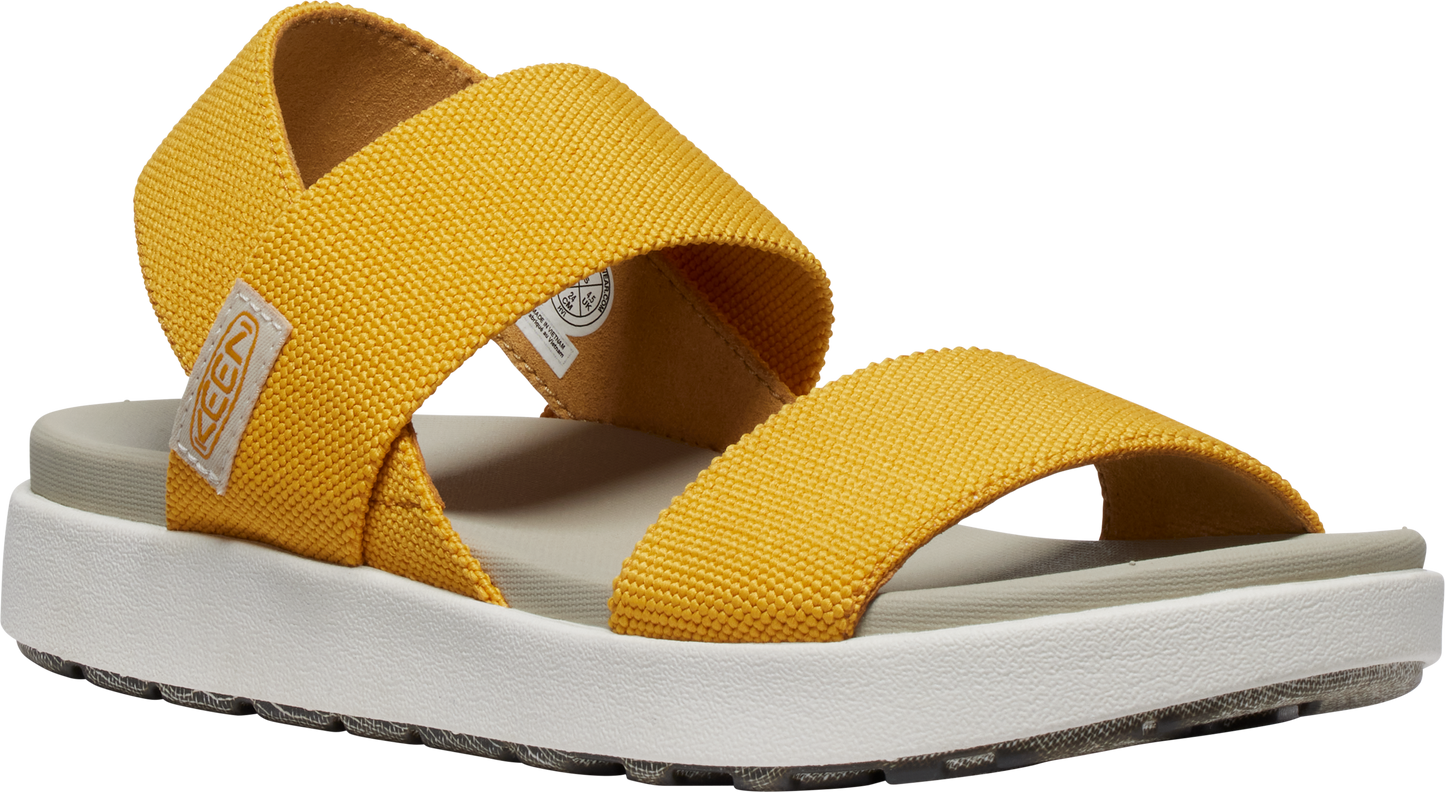 Yellow sandal with thick elastic straps and white and gray sole.