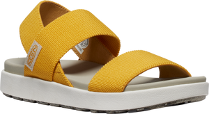 Yellow sandal with thick elastic straps and white and gray sole.