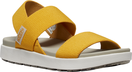 Yellow sandal with thick elastic straps and white and gray sole.