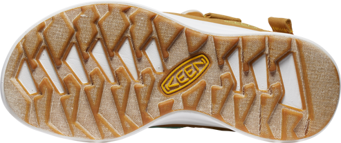 Tan shoe outsole with white recesses and 'KEEN' brand label.